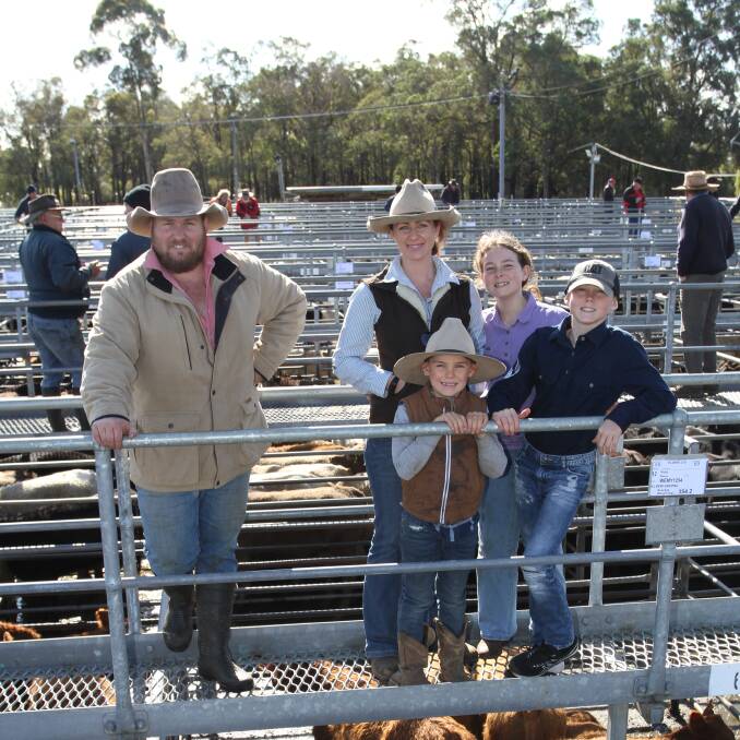 Josh Hynes (left), Elders Pinjarra/Serpentine with sale vendor Ange Rogers and her children Caprice, Rusty and Sully, Millview Grazing, Coolup. The Rogers family sold Angus and Murray Grey cross steers to 436c/kg and $1575 at the sale.
