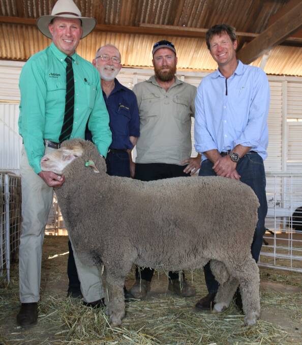With the $4700 top-priced Poll Merino ram at the 70th annual Cranmore on-property ram sale at Walebing last week were sale auctioneer Grant Lupton (left), Nutrien Livestock Wongan Hills, buyers Don and Matt McKinley, DT & M McKinley, Moora and Cranmore stud co-principal Kristin Lefroy.