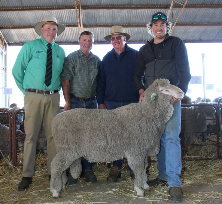Sale auctioneer Grant Lupton (left), Nutrien Livestock Wongan Hills, Glen-Byrne stud principal Bruce Edmonds, Calingiri and buyers Norm and Clint McPherson, Newhome Farm Pty Ltd, Moora, with the $3600 top-priced Glen-Byrne ram at the sale.