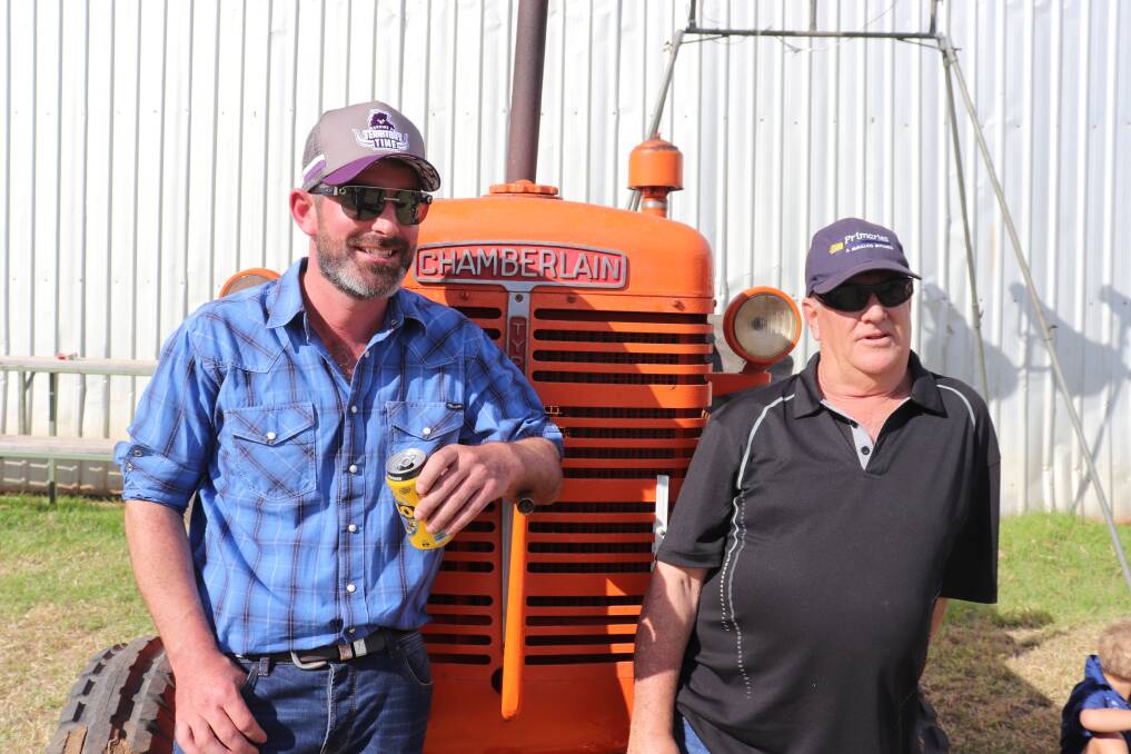 Irish import Con O'Sullivan (left) with Karl Soper from Perth leaning against an old Chamberlain tractor while they watched the tractor pull at Lights On The Hill tractor rally at Brunswick.