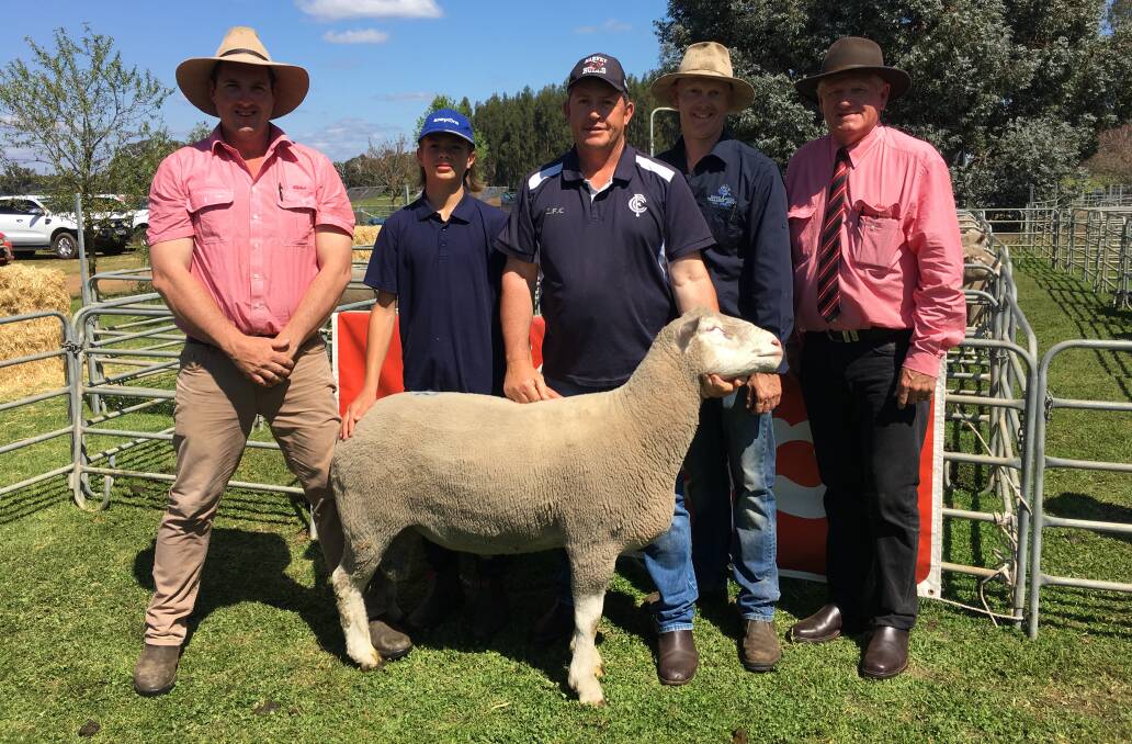 With the $1400 top-priced ram at the Tellerup Brook on-property Poll Dorset ram sale at Manjimup on Monday were Elders Manjimup representative Cameron Harris (left), buyers Jack and Todd Wilson, Willow Park stud, Cookernup, Tellerup Brook principal Kim Edwards and Elders auctioneer Deane Allen.
