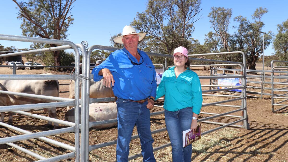  Bruce and Annabelle Garratt, BW & AE Garratt, Walkaway, picking out their catalogue favourites before they purchased four Charolais bulls at the sale costing to $7000.
