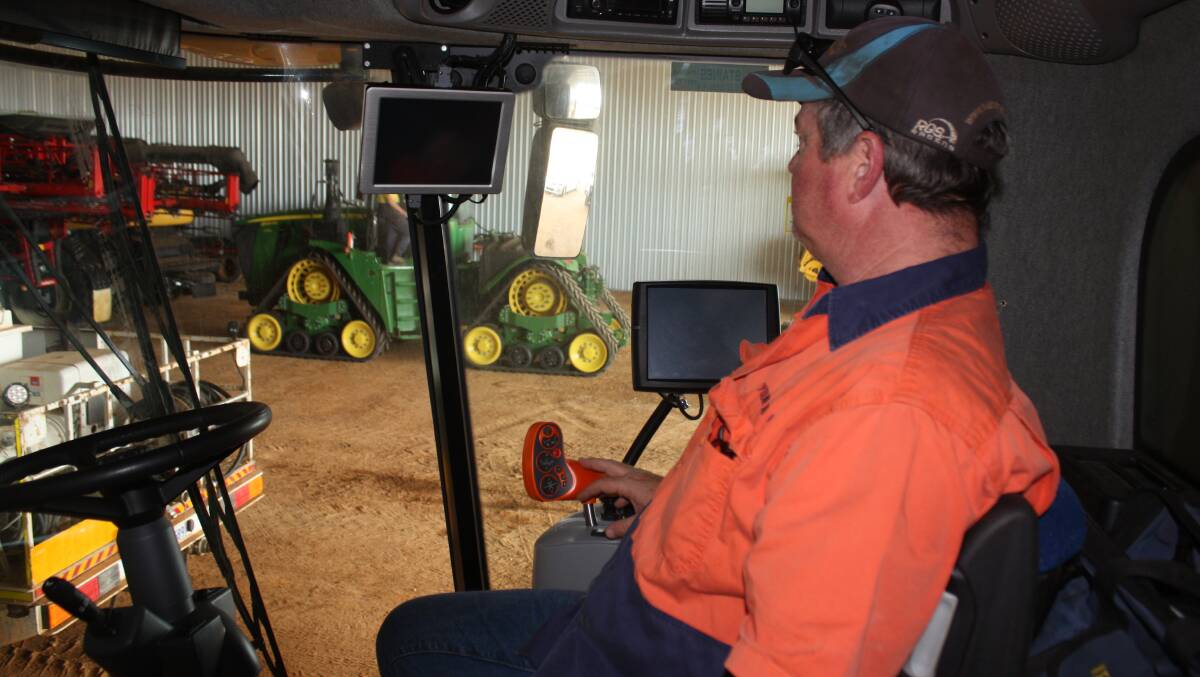 Neridup farmer Matt Hill can make more accurate calculations for variable rate nitrogen application using data from the Cropscan 3300H, mounted on the cab pillar. The header will be driven out of the shed next week to start the harvest.