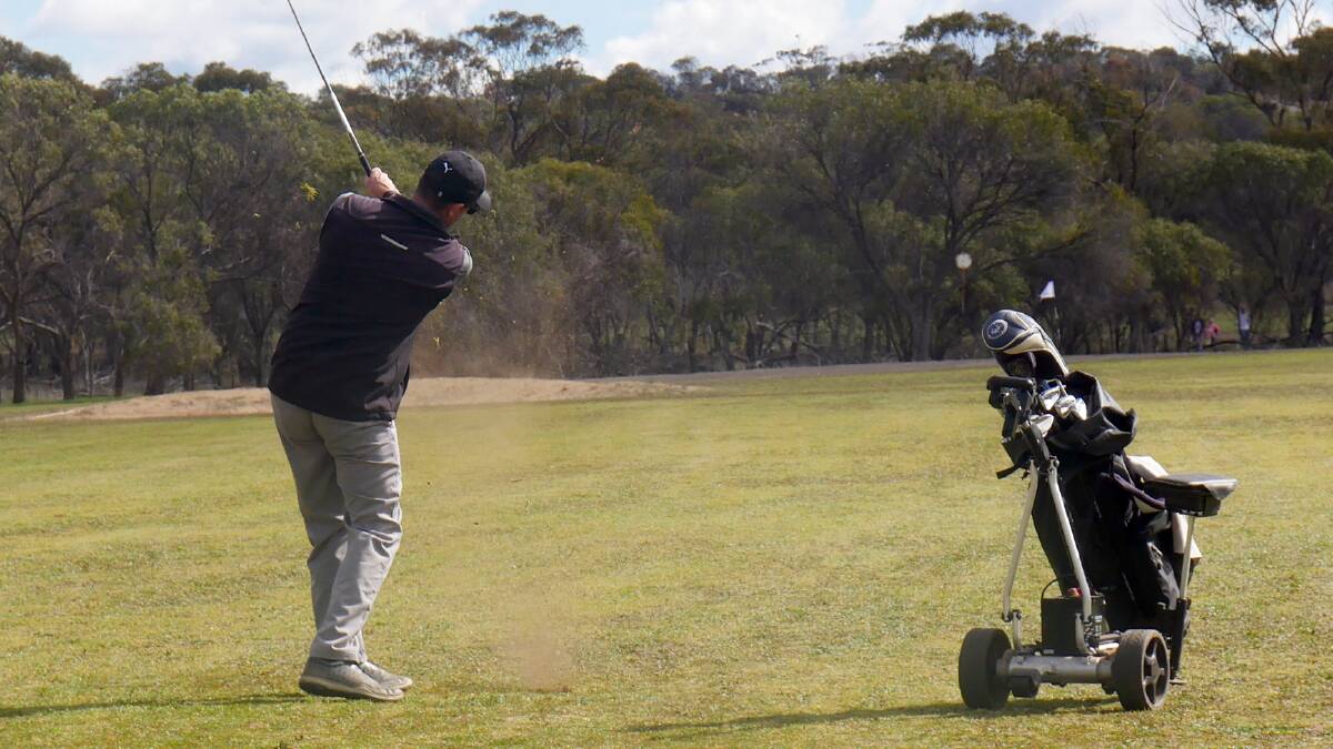 Adam Davey, Busselton Golf Club playing a beautiful fairway shot and challenging the leader.