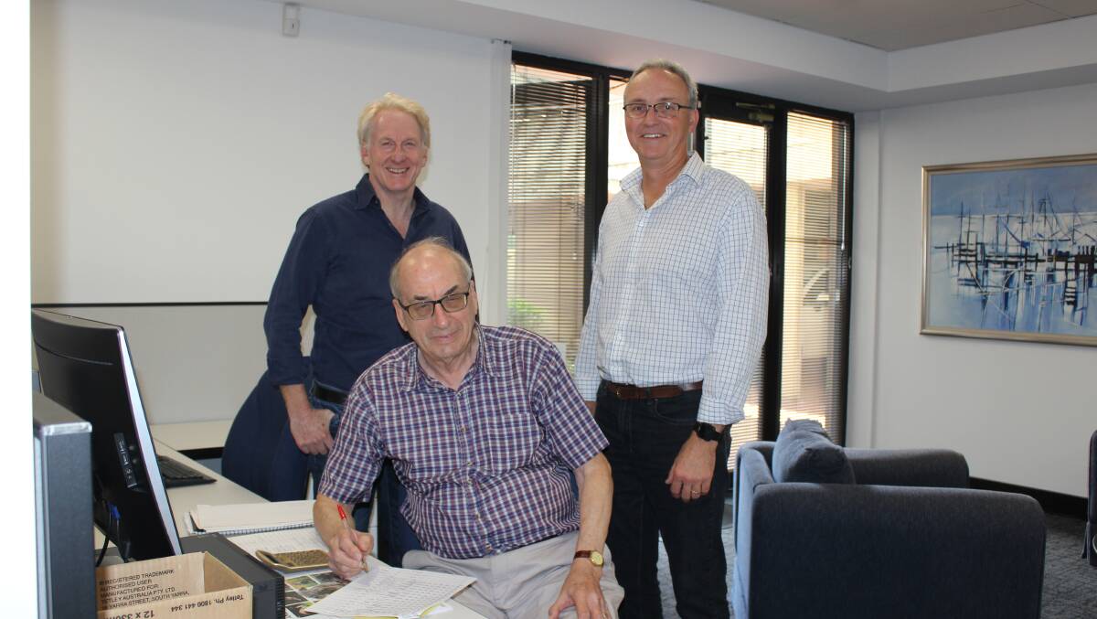 Australia's oldest wool valuer Bill Servent (seated) turned 80 in March. He is pictured with PJ Morris Exports colleagues, managing director Pete Morris and wool buyer Darren Calder. Mr Servent began his 63-year career in the wool industry in Bradford, once the wool processing and fabric making hub of the United Kingdom, before coming to Australia in 1968.