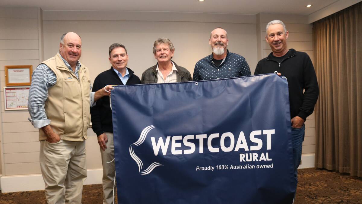 With a banner depicting the companys new logo and Westcoast Rural naming rebrand were WA real estate manager Peter Storch (left), managing director Gerald Wetherall, Kulin livestock representative Barry Gangell, WA wool manager Danny Burkett and WA general finance manager Geoff Geary.