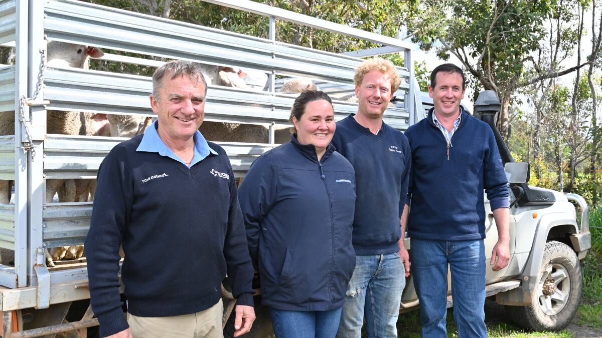  One of the volume buyers of the day were Emma and Wayde Robertson (centre), WM & CM Robertson, Boyup Brook, who bought seven rams at auction averaging $1064 a head. With them were Westcoast Wool & Livestock auctioneer Chris Hartley (left) and Wilgarna stud principal Clint Westphal.