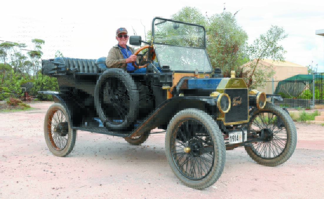 Vintage car enthusiast John Smith, Mukinbudin, in his 1914 Model T Ford. Mr Smith built the wire wheels, made the upholstery and replaced the old oil lights with bulbs.