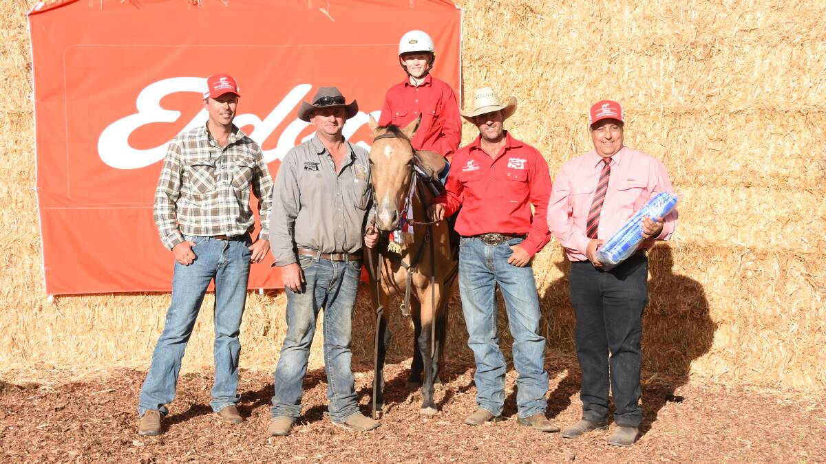 The top price for a mare or filly under the hammer was $13,500 paid for this mare, Nuwarina Little Lizzy offered by Triple R Farm, Anniebrook. With the buckskin mare were buyer Clint Thompson (left), Wyloo station, Pilbara, Steve Rosser, representing his daughter Adele, who sold the mare, Mr Thompsons son Levi, the horses preparer Jim Laverty, Collie and Elders southern regional manager George Panayotou.