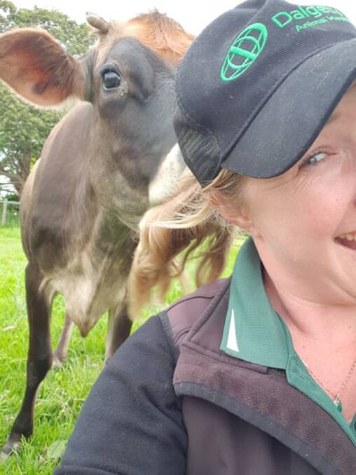 "I think she likes the taste of my hair," said Sarah Rose, Roelands, with pet cow Rosetta.
