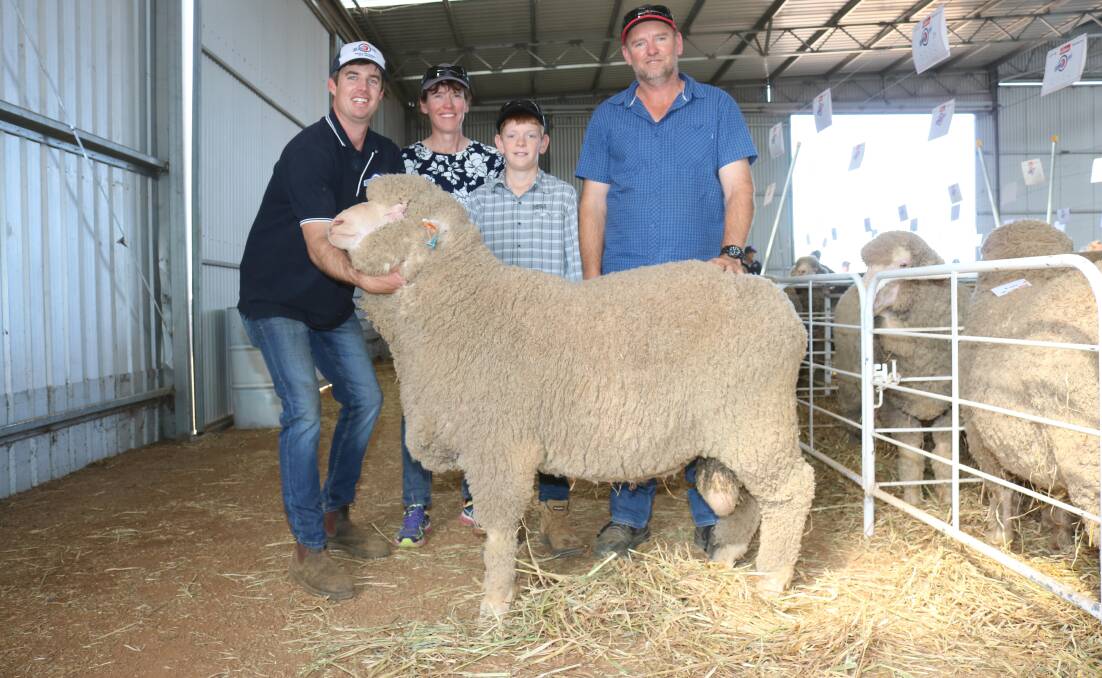 With the $7000 second top-priced Poll Merino were Kolindale stud principal Luke Ledwith with buyers Linda, Sean and Peter McCrea, Salmon Gums.