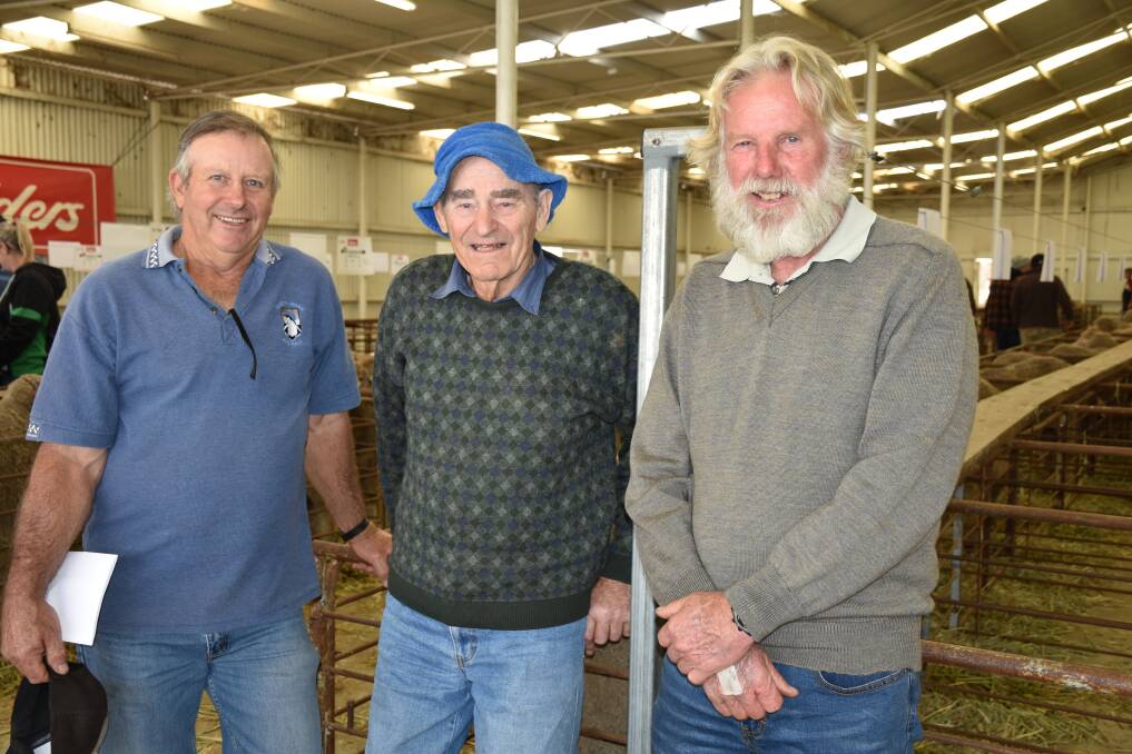 Two of Rutherglen's newer clients Ron Bingham (left), Boyup Brook, and Gary Cowcher (right), Williams, are with Rutherglen stud principal Buster Dawes who will celebrate his 91st birthday in early October. Mr Dawes formed the stud in 1952 on a base of Hazeldean lines.