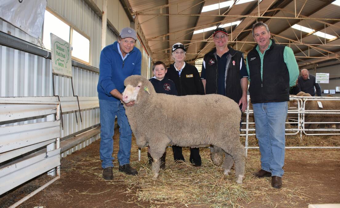 Prices hit a high of $5000 at the Belmont Park on-property Poll Merino ram sale at Wagin. With the top-priced ram were Belmont Park co-principal Raymond Edward (left), buyers Viv and Doug Giles and Dougs son Ned and Nutrien Livestock stud and commercial sheep manager Tom Bowen.