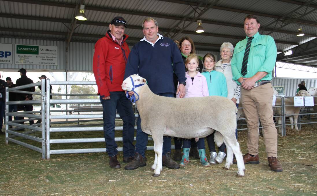 With the new $29,250 WA State record top-priced White Suffolk ram offered by the Ida Vale stud, Kojonup, at the WA Elite White Suffolk, Suffolk and Poll Dorset sale at Williams on Monday were Peter Wharton (left), Elders Kojonup, Andrew Greenup, Tamesha Gardner, Lexi and Sophie Greenup and Di Gardner, Ida Vale stud and Roy Addis, Nutrien Livestock Breeding, who purchased the ram on behalf of an Eastern State's syndicate of the Booloola, Charinga and Induro White Suffolk studs.