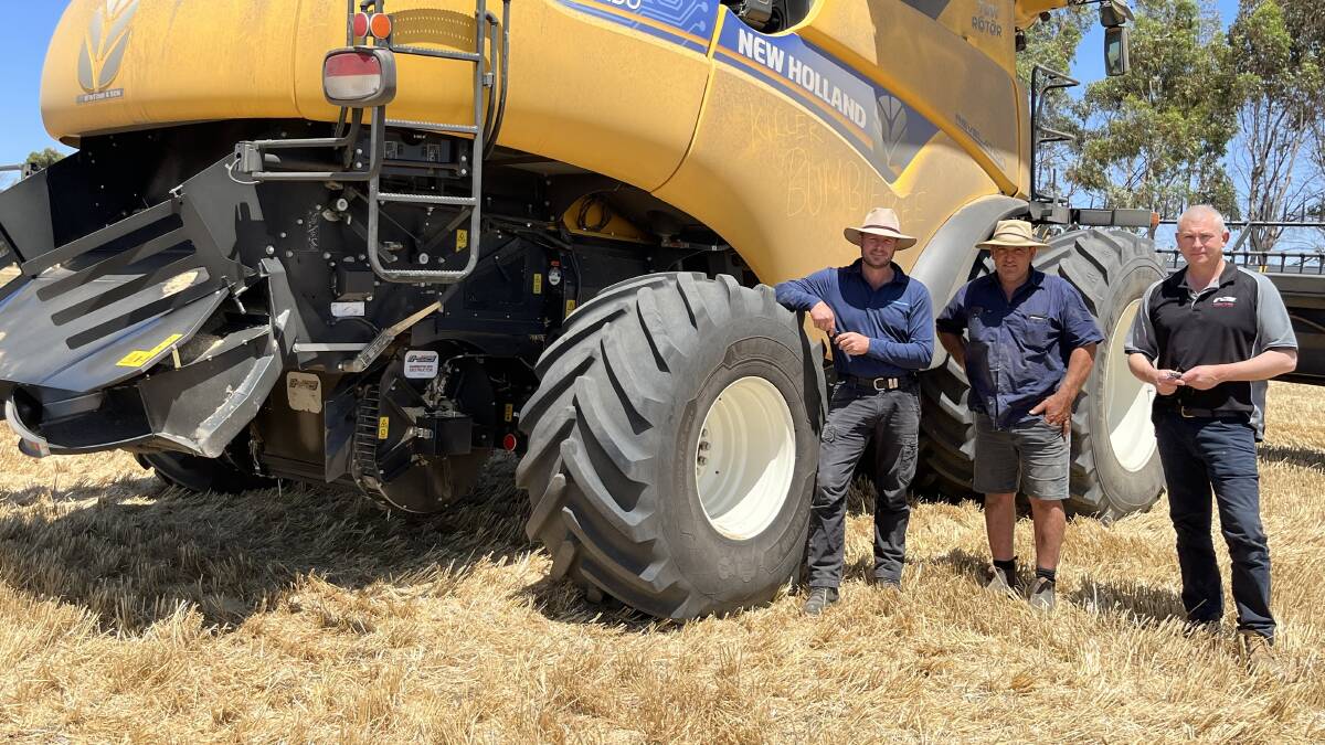 Carey Loton (left), McIntosh & Son, Wongan Hills and Andrew Vearing (right), product support manager with de Bruin Engineering, caught up with Toodyay grower Aaron Candeloro during the recent harvest to update the performance of the familys latest vertical, mechanical direct drive Seed Destructors.