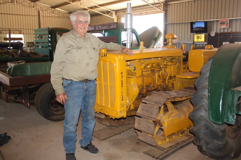 Local farmer John Dunne shows off this Caterpillar D2 crawler tractor which he donated to the Men's Shed. It was one of the first of its kind in the district and according to John his father Harry used to use it for everything.