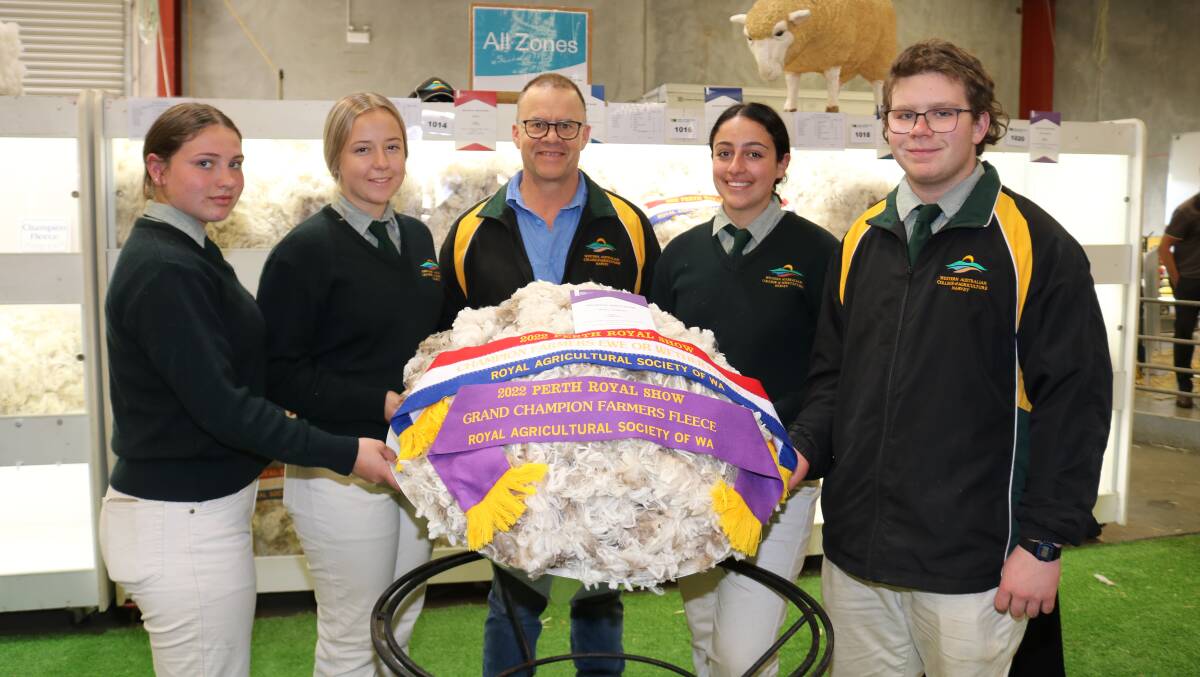 With their grand champion farmers fleece were WA College of Agriculture Harvey year 11 students Ella Gardiner (left), Pinjarra, Page Kirk, Wagin, technical officer sheep, Steve Adams, Charlotte Telini, Dardanup and year 12 student Tristan Clarke, Busselton.