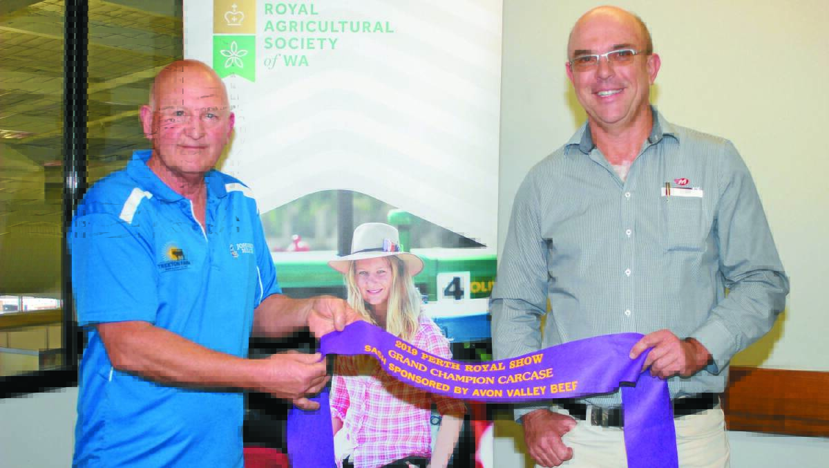  Celebrating the Dimasi family's, Paradise Beef, Donnybrook, win in exhibiting the grand champion and champion heavyweight carcase were Johnson Meats managing director Terry Russell (left) and sponsor John Mitchell, Mitchell's Transport, Waroona.