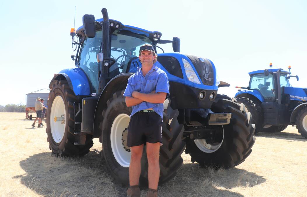 Jonty Petchell, Williams, with the top lot $240,000 tractor he just successfully bid for at the Gillett family clearing sale. The 2022 New Holland T7.260 with Auto Command transmission had only 62 hours on it and in the cab retained a new tractor smell, but according to Mr Petchell it cost quite a lot less than an equivalent new tractor.