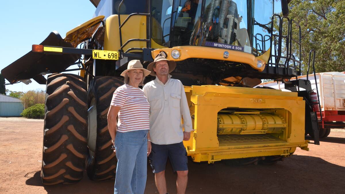 Jane and Damon Treloar, Boyup Brook, with the very tidy New Holland CR 9070 combine harvester which was offered with a 10.9 metre New Holland front and locally-made comb trailer, but failed to attract a bid.