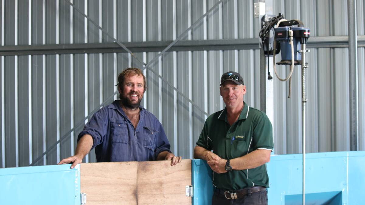It's all smiles in his shiny new shearing shed for Northampton producer Mick O'Brien (left), pictured with his stock agent Murray Paterson, Landmark Geraldton, earlier this month.
