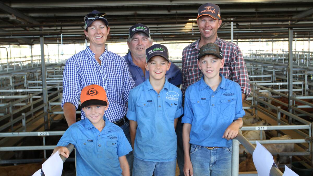 Prospective buyers Shanon and Clint Thompson, Wyloo station, West Pilbara, and their sons Sam (front left), Blake and Levi with Shanons uncle Steven Dellar (second left), Dandaragan, before the Muchea sale.