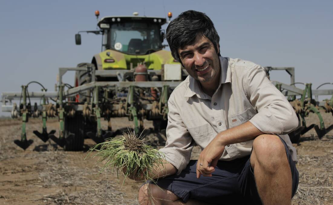  The UWA's inaugural agricultural engineer Dr Andrew Guzzomi with the weed chipper.