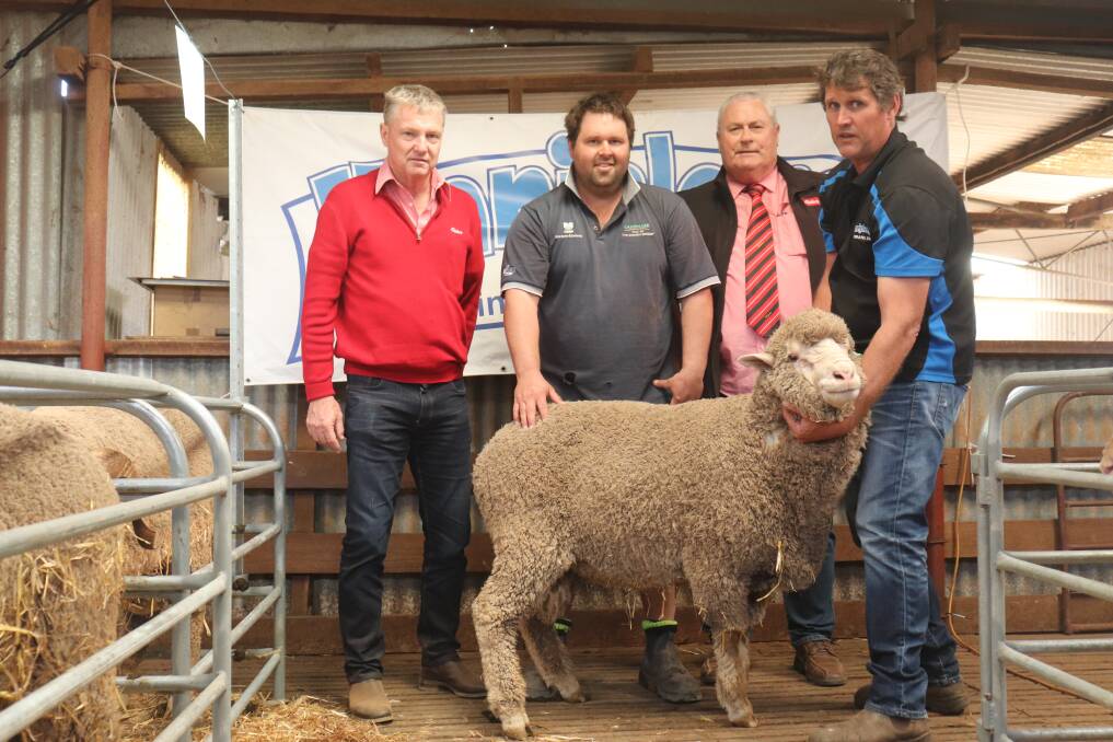 Elders commercial sheep manager WA, Mike Curnick (left), equal top price buyer Clint Butler, South Kumminin, Kevin Broad, Elders stud stock representative and Wanjalonar classer, and Wanjalonar stud principal Derek Hooper with the $1500 Poll Merino ram at Narembeen.