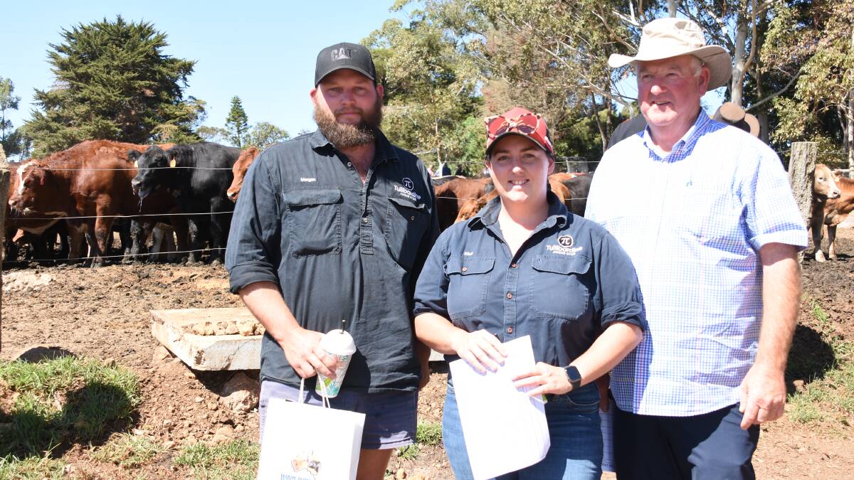 Inspecting the cattle in the feedlot were Morgan Gilmour (left) and Eliza Bradfield, Tullibardine Angus stud, Albany and Graham Ravenhill, Ravenhill Pastoral, Narrikup.