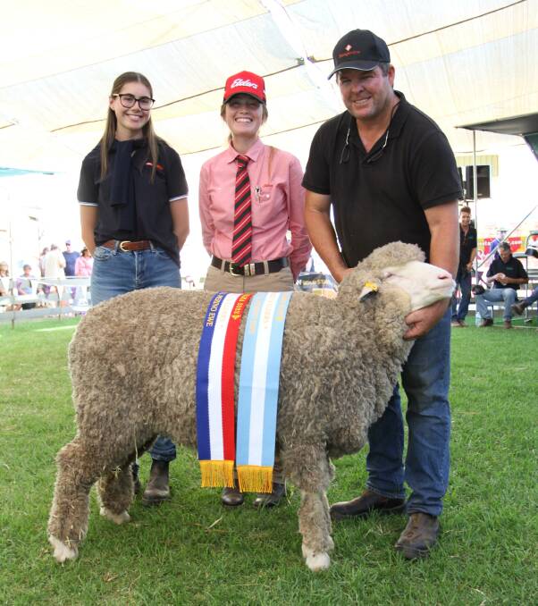 With the reserve grand champion Poll Merino ewe and champion fine wool Poll Merino ewe were sponsors Kyah Peeti (left), Farm Weekly and Lauren Rayner, Elders stud stock and Rangeview stud co-principal Jeremy King, Darkan.