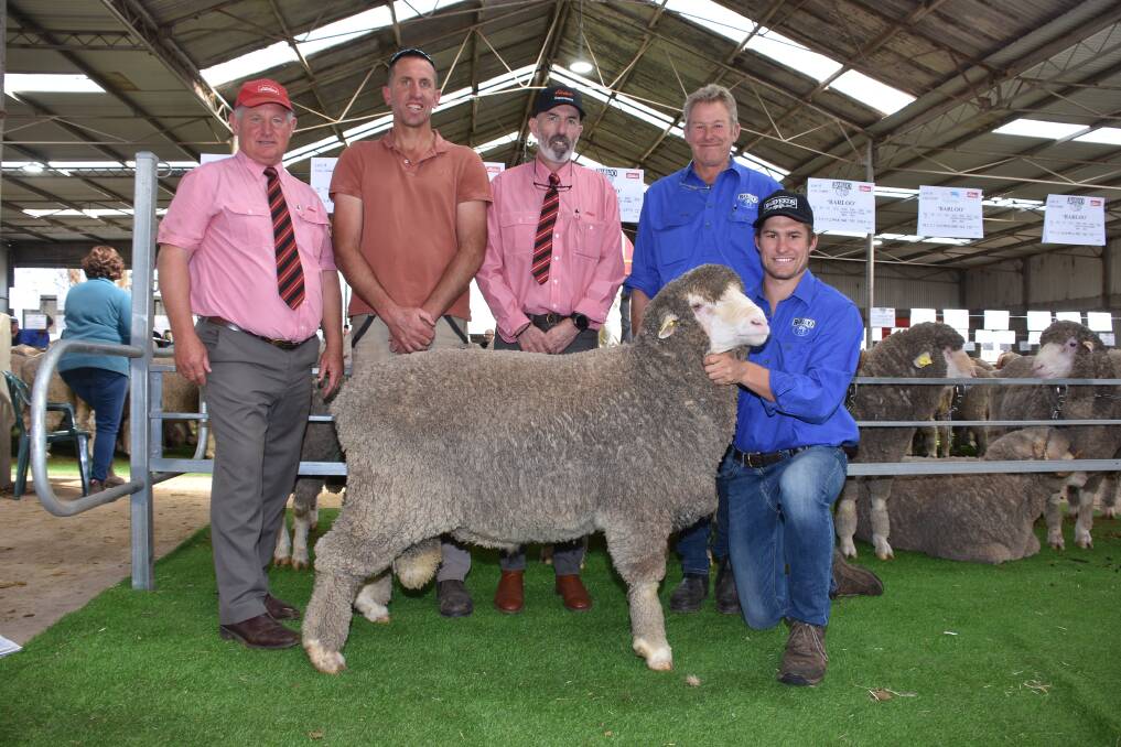 Prices at the Barloo/Willemenup on-property ram sale at Gnowangerup last week topped at $8750 for this Willemenup Poll Merino sire. With the ram were Elders stud stock representative and Barloo classer Russell McKay (left), buyer Wayne Pech, North Stirling Downs Pty Ltd, Gnowangerup, Elders State wool and livestock manager Dean Hubbard and Barloo/Willemenup co-principals Richard and Timm House.