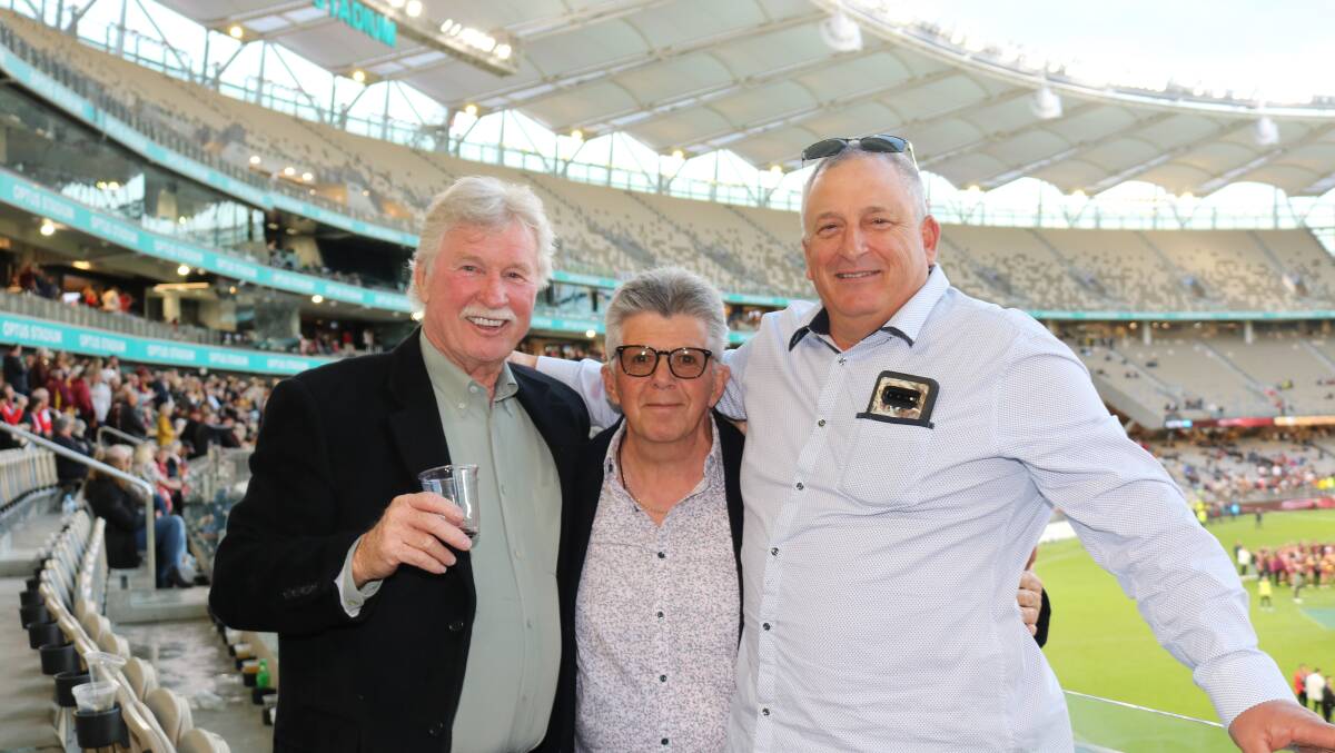Doing a bit of grand final 'coaching' from the sidelines were WACFL life member Terry House (left), Dominic Frisina and Steven Italiano, all from the Harvey Brunswick Lions Football Club.
