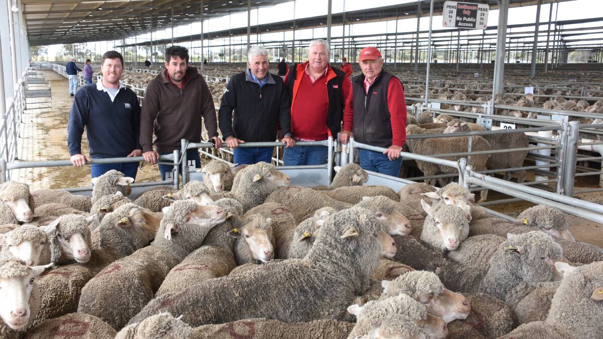 With the $192 top-priced line of ewes at last weeks Elders Katanning Premier Ewe Sale offered by the Patterson family, Bibikin Farms, Woolkabin stud, Woodanilling, were Hamish Ball (left), with his brother-in-law and father-in-law Ben and Eric Patterson, Bibikin Farms, Woolkabin classer and Elders stud stock representative Kevin Broad and Elders Katanning agent and stud stock representative Russell McKay. The line comprised of 413 July shorn, Woolkabin blood, 1.5yo ewes.