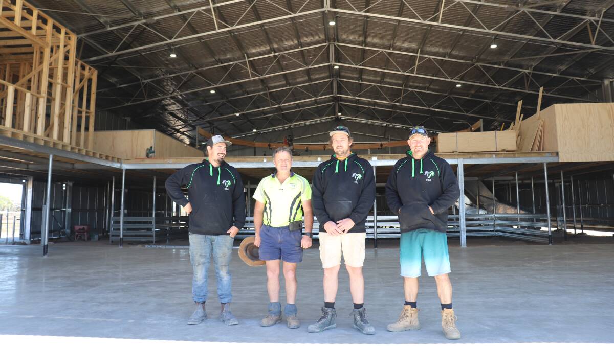 Builder Chad Lavender (left), client Geoff Bilney and construction workers Brady Williamson and Dan Robbins in the front of the new Glenpadden Farms' shearing shed at Kojonup in October. It was the first in Western Australia constructed to a modified Australian Wool Innovation design likely to become the industry standard.