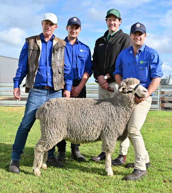 Prices reached a new stud sale record top price of $37,000 at the annual Moojepin on-property ram sale at Katanning, which was outlaid by AuctionsPlus online bidder Nigel Kerin, Kerin Poll Merino stud, Yeoval, NSW. With the top-priced ram were Moojepin stud co-principal David Thompson (left), farm hand Bodean Morton, Nutrien Livestock auctioneer Michael Altus and Moojepin stud co-principal Hamish Thompson.