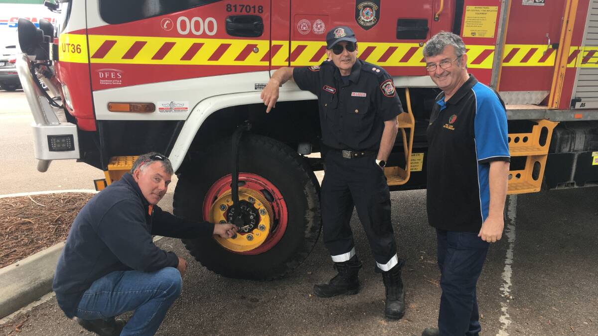 Gibson Volunteer Bush Fire Brigade's Danny Smith (left), station officer operational research and development Kevin Clarke and Pink Lake Volunteer Bush Fire Brigade Andrew Waters discuss changes to the fleet.