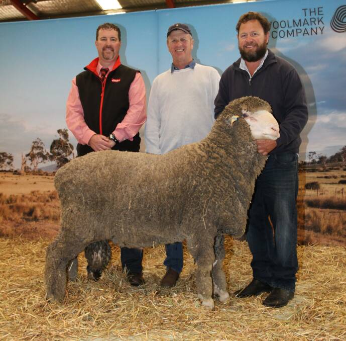 With the Claypans ram that sold for $5000 were Nathan King (left), Elders stud stock, buyer John Hewett, Chas Hewett & Co, Corrigin and Claypans stud co-principal Steven Bolt, Corrigin.