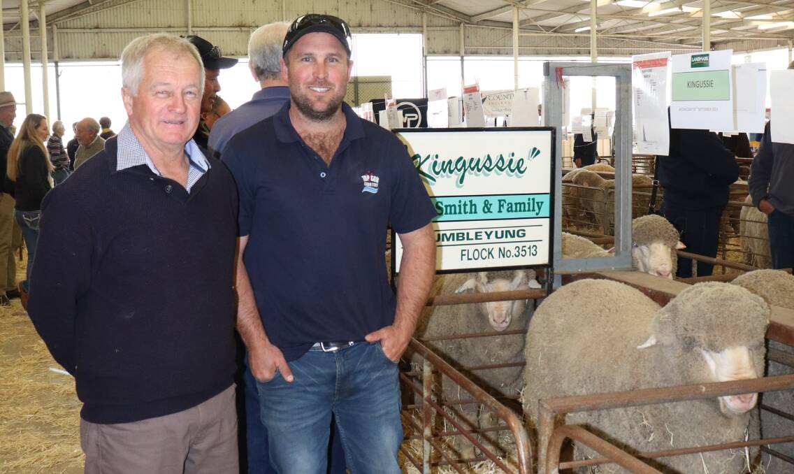 Landmark Narrogin agent and ram preparer, Ashley Lock (left), looked over the rams on display from the Dumbleyung-based Kingussie stud with co-principal Lee Smith.