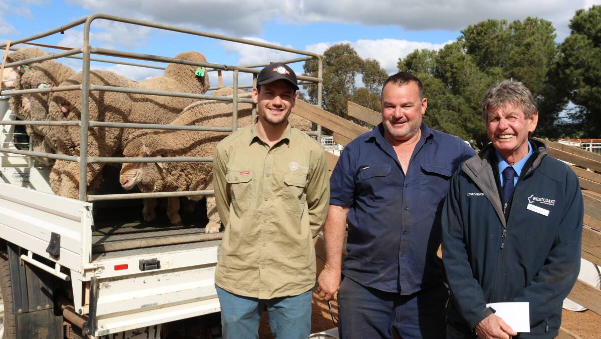 Lewisdale-Corrigin clients of 39 years Dane (left) and his father Kim Stephen, Moorine Rock, had help from Barry Gangell, Westcoast Wool & Livestock, Kulin, to load their five polled rams.