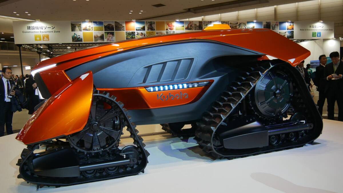 A side view of the autonomous Kubota X-cross tractor which is designed with an adjustable chassis and track shape to suit various ground clearance applications.