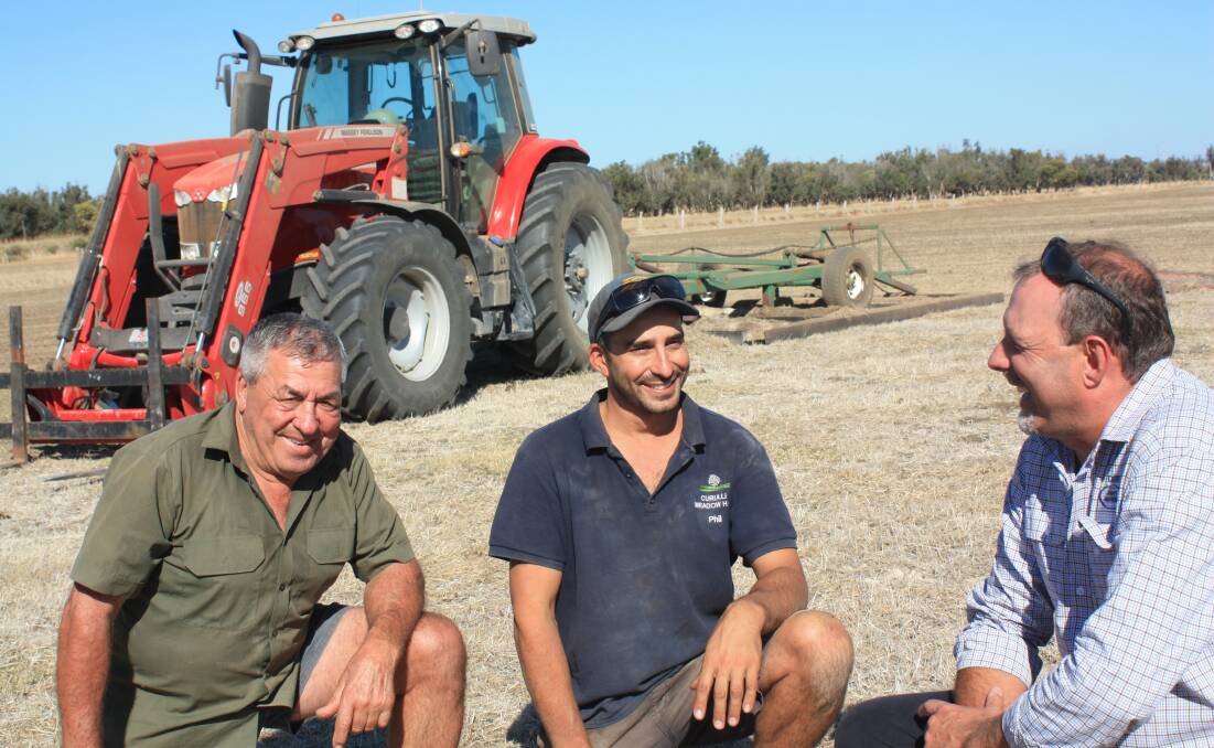Cookernup hay and beef producer Paul Curulli (left) with his son Phil and Bunbury Machinery branch manager Darren Pulford.