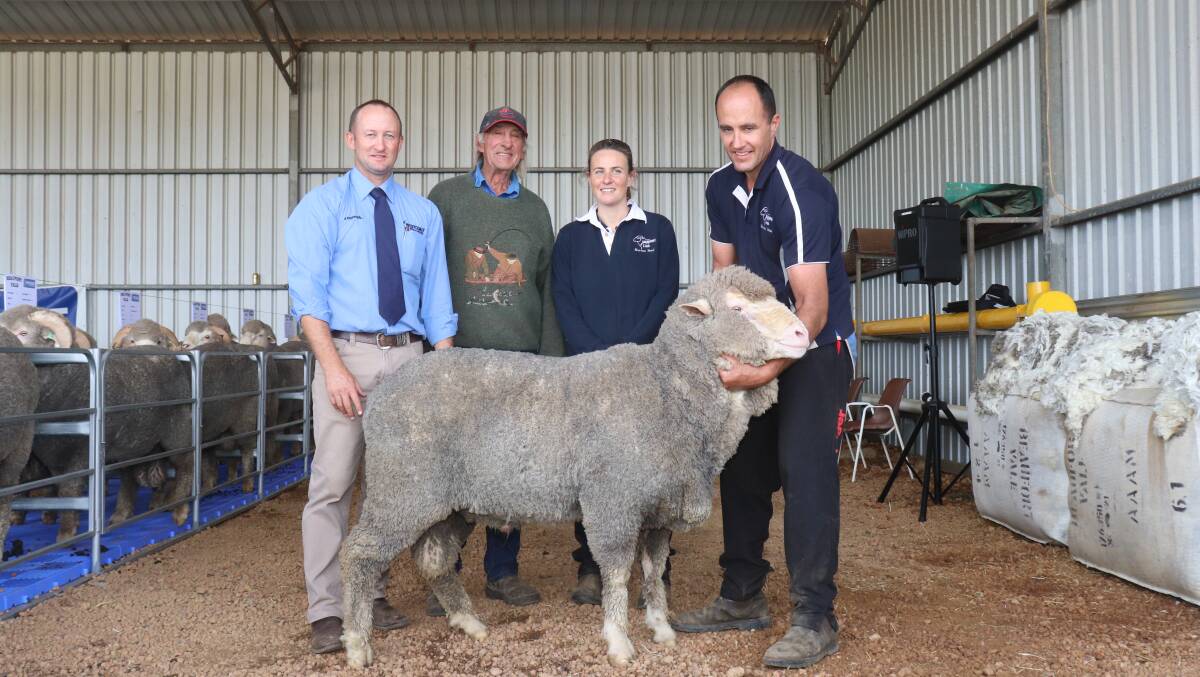 Westcoast Wool & Livestock representative Mat Lowe (left), top price buyer Richard Forbes, Boyup Brook and Beaufort Vale stud owners Lisa and Darren Chapman with the $7000 Poll Merino ram at Boyup Brook.