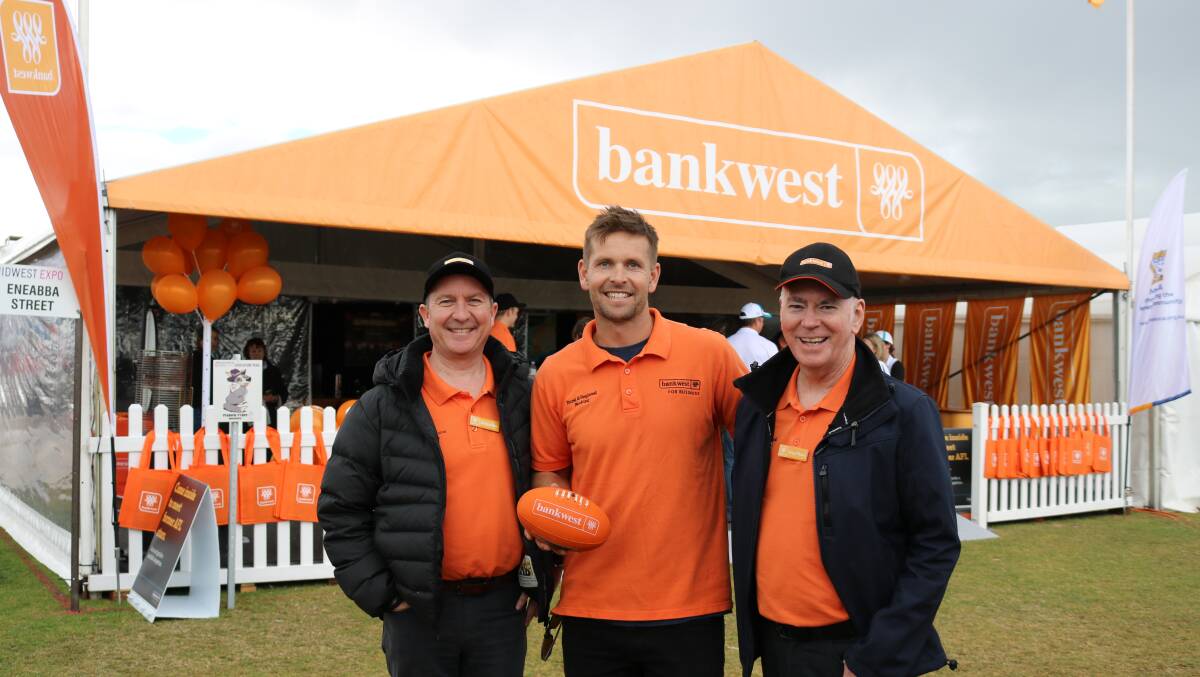 Former West Coast Eagles player Mark LeCras (centre) was a drawcard in the Bankwest stand at the McIntosh & Son Mingenew Midwest Expo, joined by Bankwest's general manager business banking Richard Bator (left) and State manager rural and regional Greg O'Brien. Since his retirement from football the 219-game veteran, premiership player, all Australian and club champion has pursued his interest in agriculture and is establishing an avocado farm and running cattle with his father Peter on a property at Gingin.