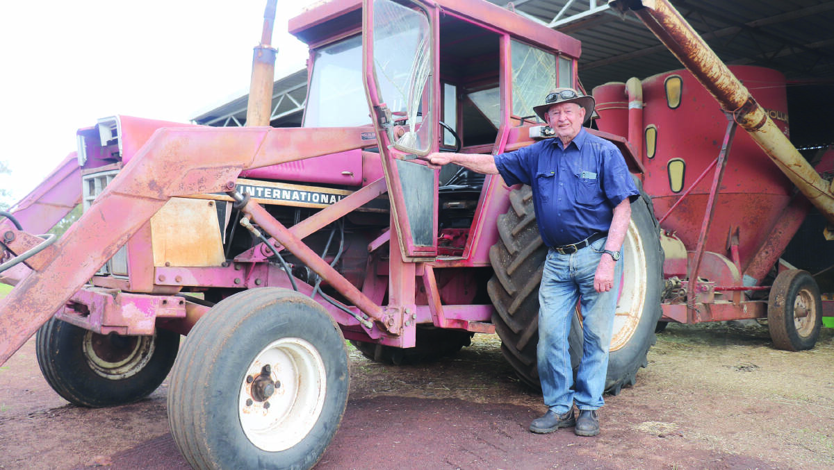 Mal Williams and his trusty International 844-S front end loader which drives a hammer mill in the shed behind it to produce sheep feed.