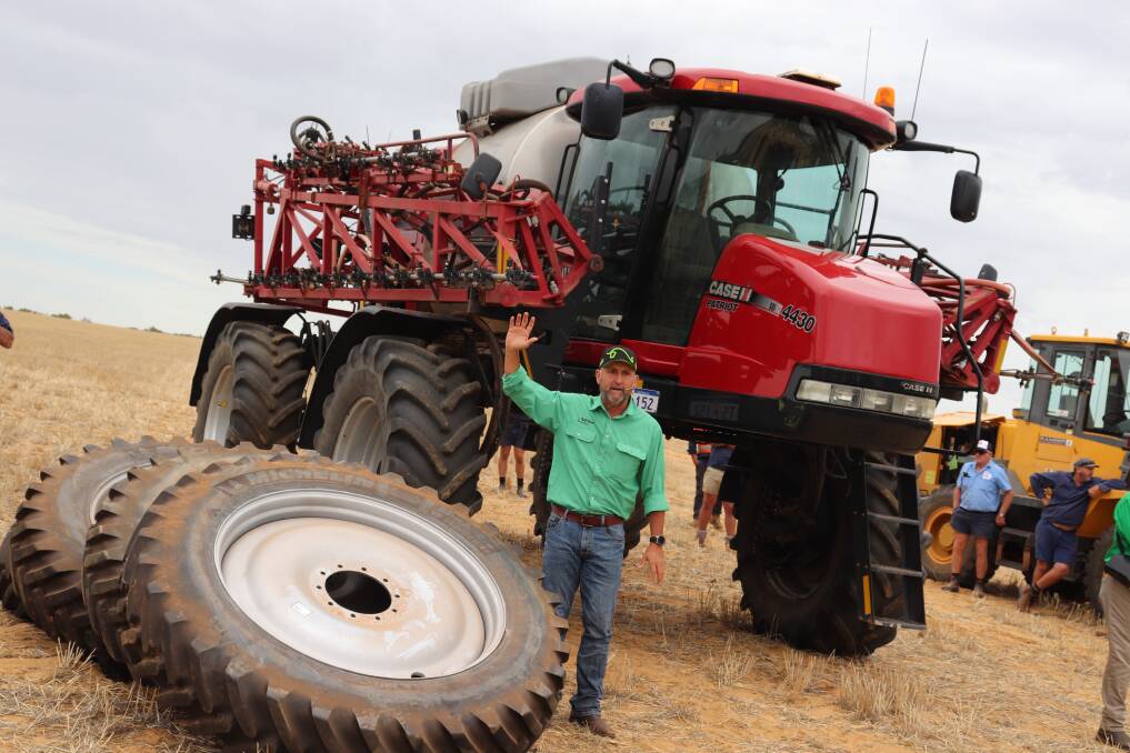 Nutrien Ag Solutions auctioneer Craig Walker, Geraldton, with the top selling item at the sale. A Case IH Patriot 4430 SP sprayer sold for $204,000. It was advertised with 3604 hours on the clock, a 120 foot boom, a 6000L tank, two sets of tyres  including 620 and 380 sizes.