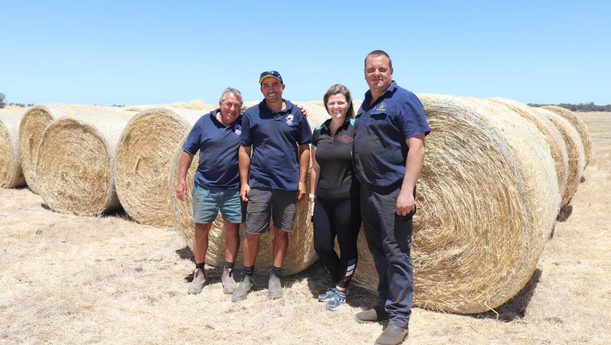 Some of the people organising the Harvey Hay Run to farmers in the New South Wales south coast region, Paul and Phil Curulli who own Curulli Meadow Hay, Cookernup, and their neighbours and hay run instigators Belinda and Joe Hall with some of the donated rounds. 