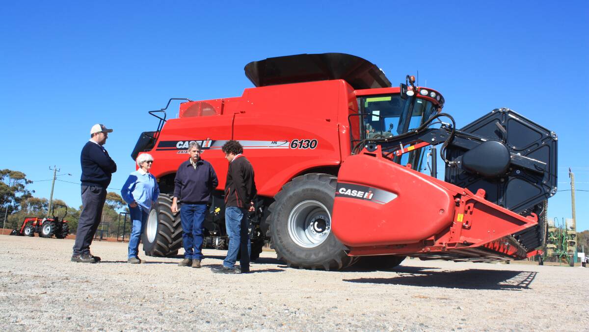 Boekeman Machinery operations manager Jason Oliver (left), Kathy and Dennis Saunders, Southern Brook and Boekeman Machinery salesman Sam Moss at last week's handover of the Saunders' new Case IH 6130 combine harvester.