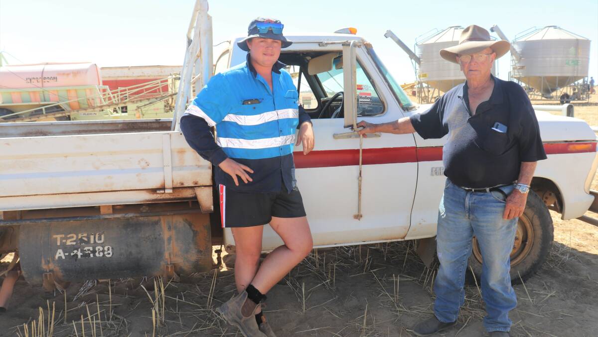 Grandson Cameron (left) and grandfather Wally Letton, Morawa, check out the Ford F350 service truck which sold later to Larrapinda Pastoral Company, Bonnie Rock, for $2000.