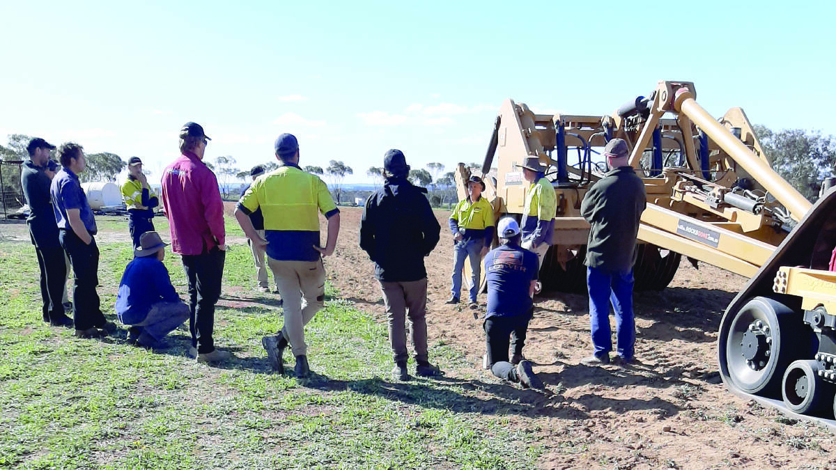 Many Torque readers would have been attending the annual Newdegate Machinery Field Days today. Instead a few farmers gathered to check out the Rocks Gone Reefinator renovating part of the field days site. Rocks Gone managing director and inventor Tim Pannell (third from right) provided all the information on how the machine worked. 