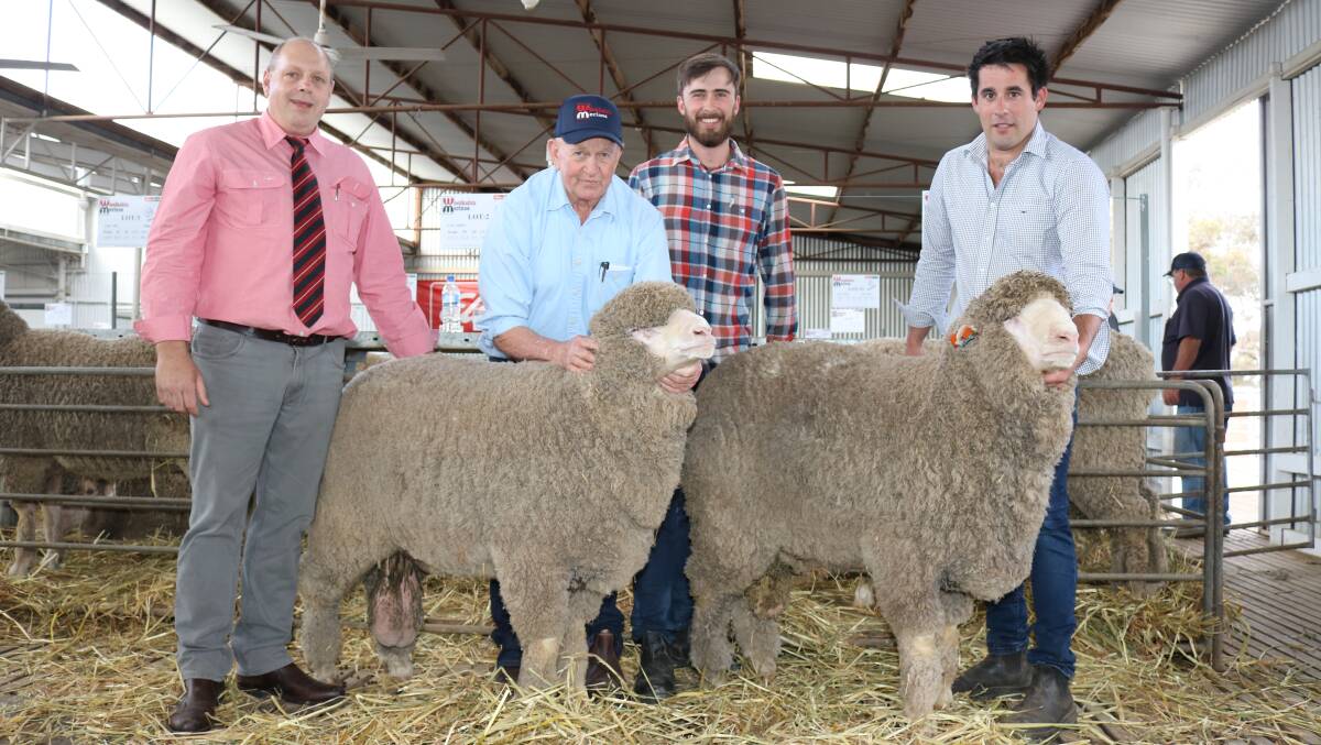 The top and second top-priced Poll Merinos sold at Woolkabin last week went to JA Kowald & O Kowald, Moonyoonooka, for $6000 and $5500 respectively. Pictured with the rams were Elders WA zone livestock manager Simon Wilkinson (left), Woolkabin stud consultant Bruce Cameron and Digby and Ben Patterson, Woolkabin stud, Woodanilling.